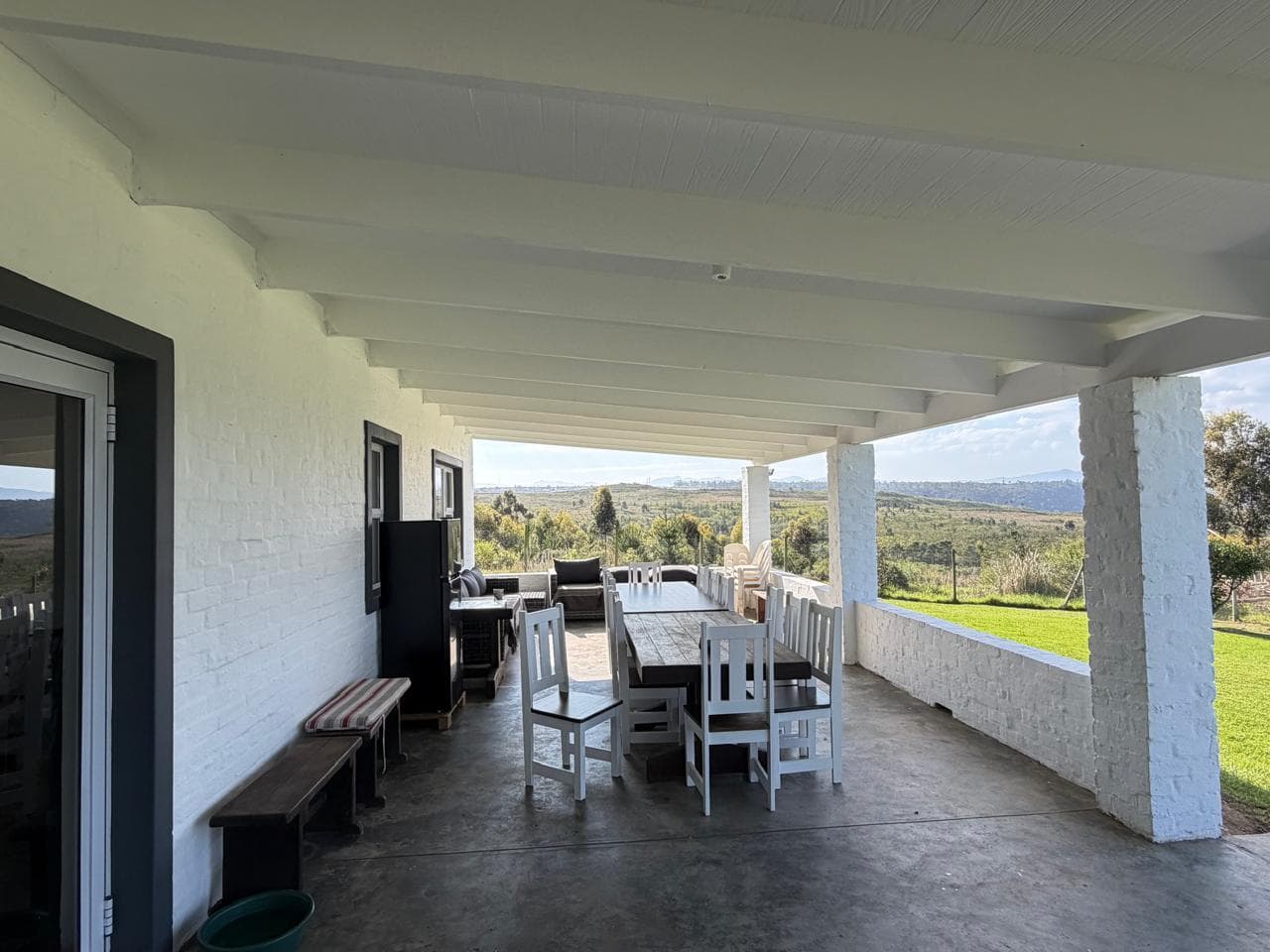 The repaired veranda, new ceiling in place, table and chairs back in use